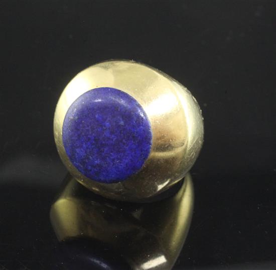 A heavy high carat gold and lapis lazuli set ring, size M.